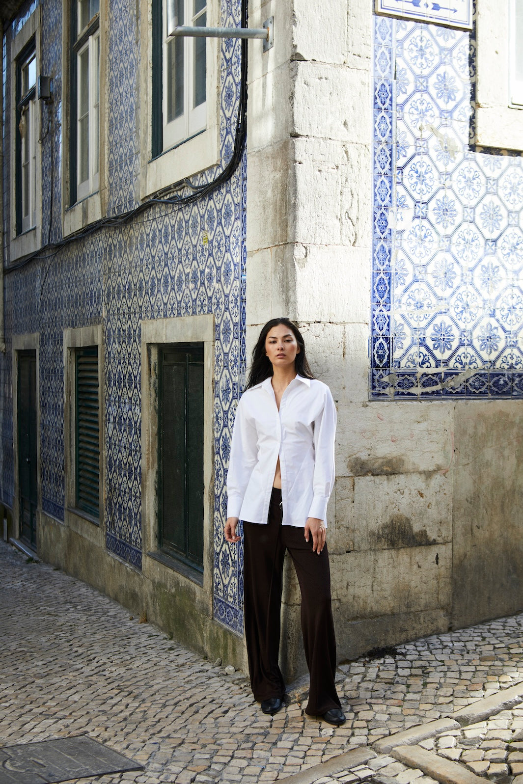 girl wearing white button up shirt