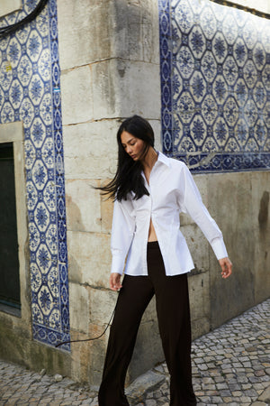 girl wearing white button up shirt