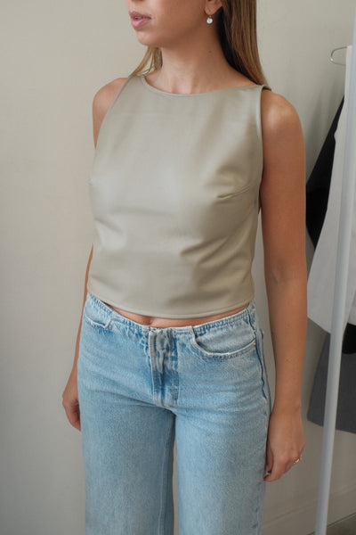 girl wearing melrose backless leather top 