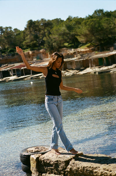 girl wearing palma top in black
