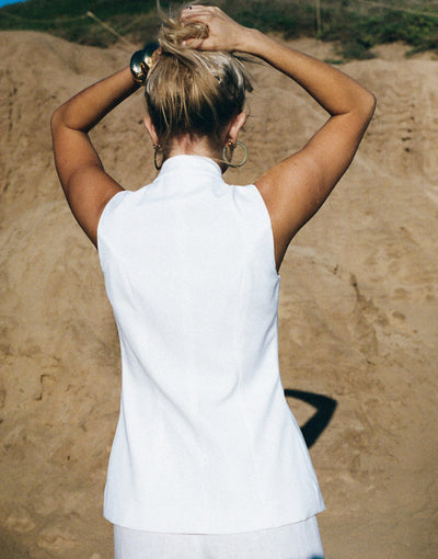 girl wearing toscana vest with chains in white